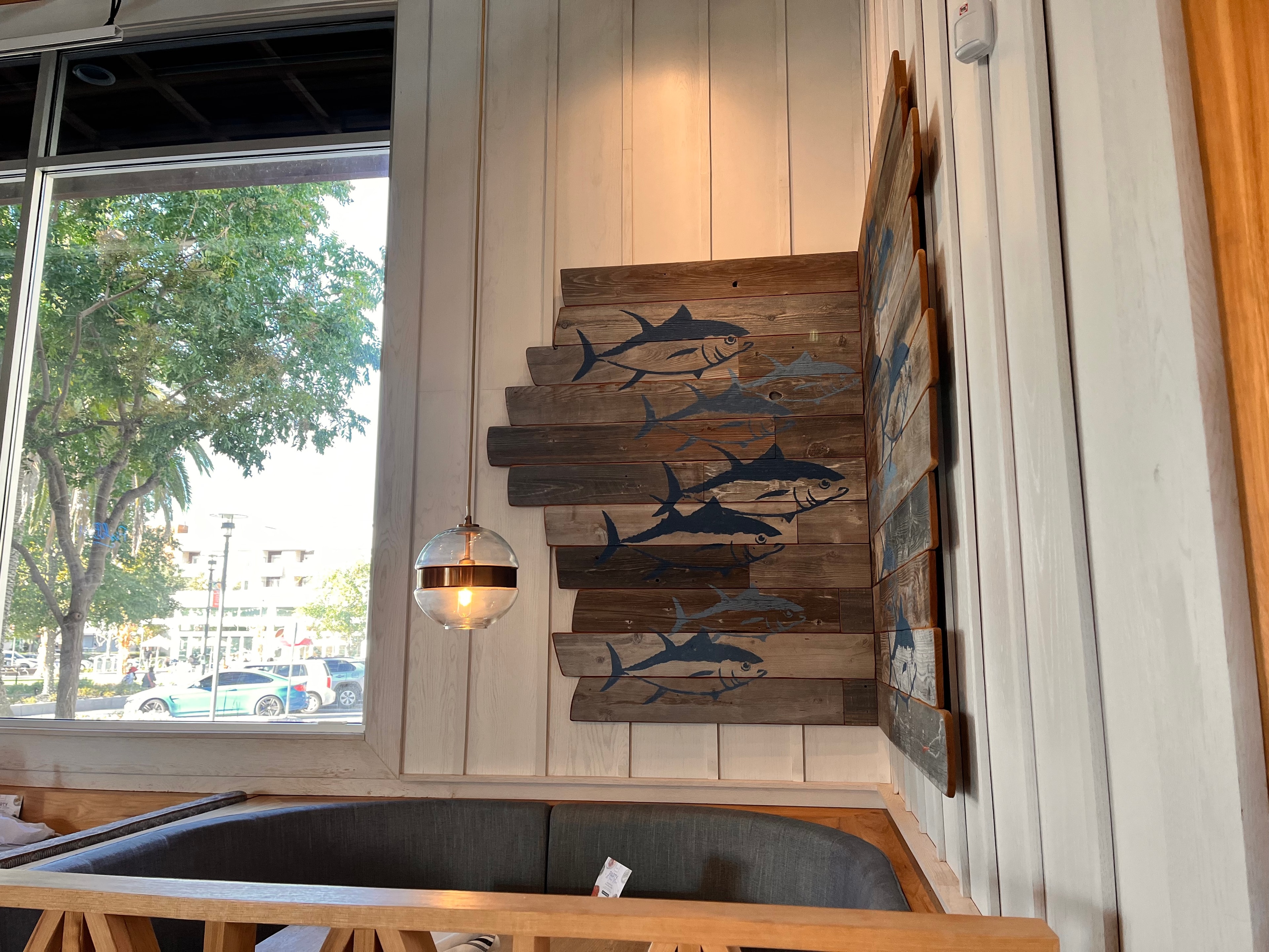 Coastal fish wall art on reclaimed wood